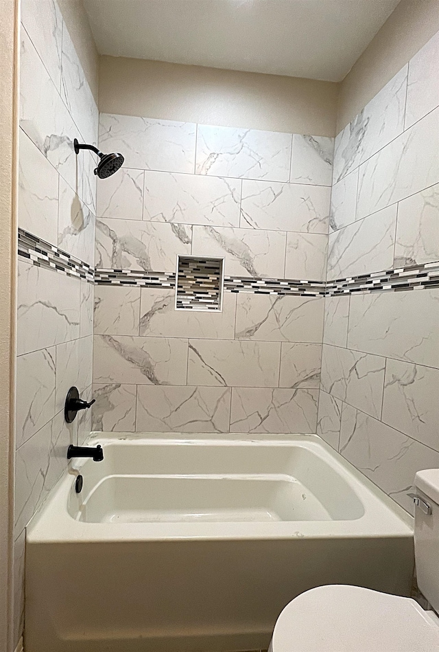 full bathroom with shower / bathing tub combination and toilet