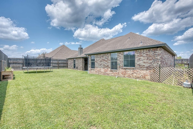 232 Spring Brook Ct, Lumberton, TX 77657 - view of yard with a trampoline