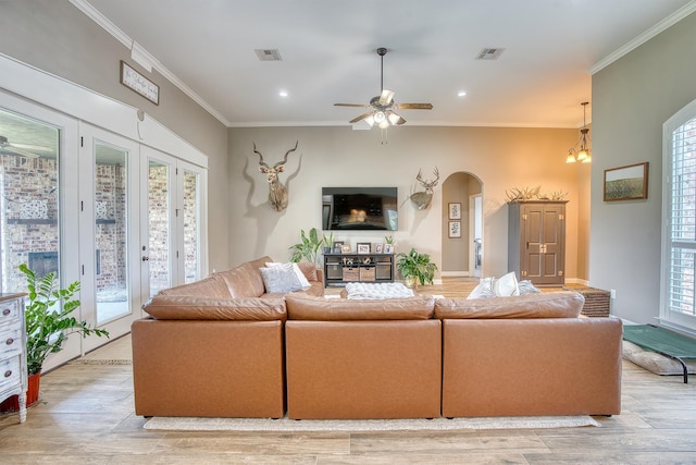 232 Spring Brook Ct, Lumberton, TX 77657 - living area with ceiling fan, arched walkways, light wood-style floors, crown molding, and recessed lighting