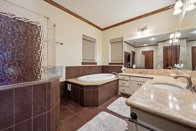 970 Hibiscus Cir, Beaumont, TX 77706 - bathroom with crown molding, double vanity, a garden tub, and tile patterned flooring
