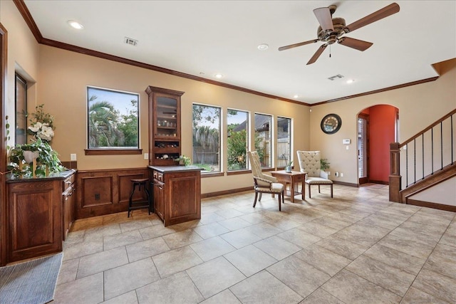 970 Hibiscus Cir, Beaumont, TX 77706 - dining area with arched walkways, stairway, ornamental molding, recessed lighting, and ceiling fan