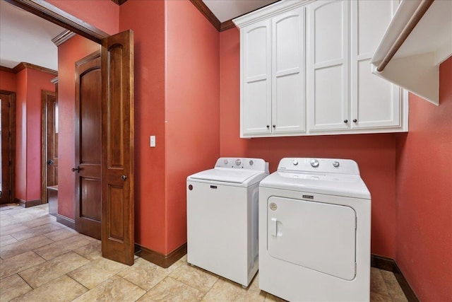 970 Hibiscus Cir, Beaumont, TX 77706 - laundry area featuring cabinet space, washer and clothes dryer, and crown molding