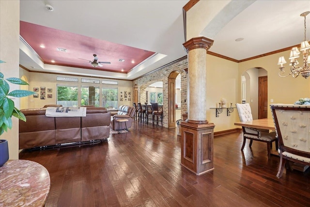 970 Hibiscus Cir, Beaumont, TX 77706 - living room featuring ornate columns, arched walkways, ceiling fan, hardwood / wood-style floors, and crown molding