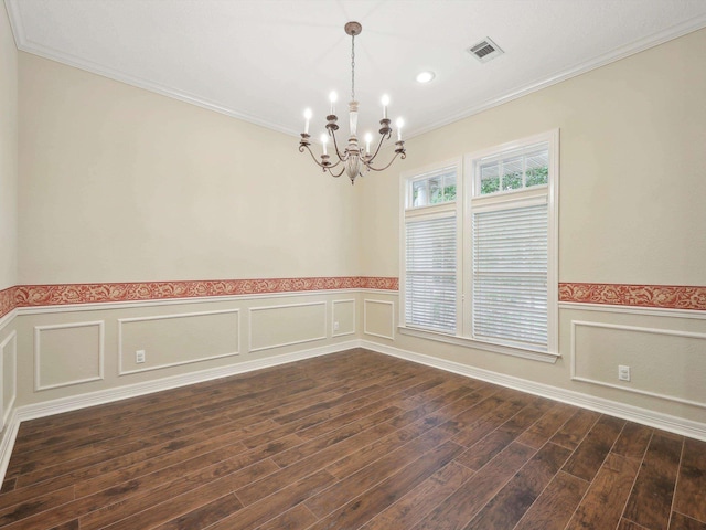 9670 Manion Ct, Beaumont, TX 77706 - spare room featuring dark wood-style floors, wainscoting, visible vents, a chandelier, and crown molding