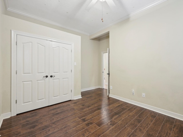 9670 Manion Ct, Beaumont, TX 77706 - unfurnished bedroom featuring a closet, crown molding, baseboards, dark wood-style flooring, and ceiling fan
