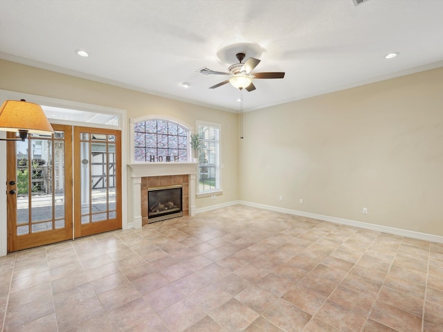 9670 Manion Ct, Beaumont, TX 77706 - unfurnished living room featuring a tiled fireplace, baseboards, recessed lighting, ceiling fan, and light tile patterned floors