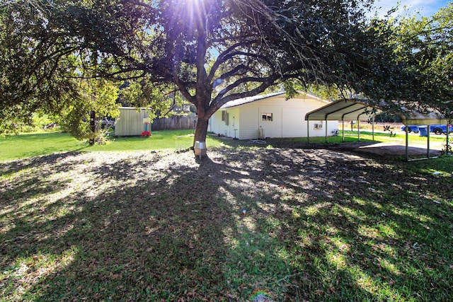 view of yard with a carport