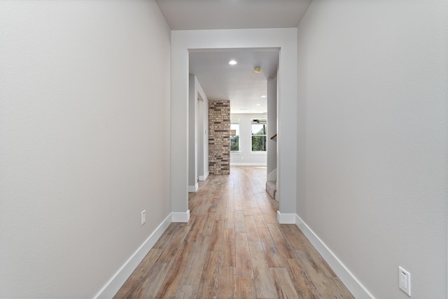 hallway featuring light hardwood / wood-style flooring