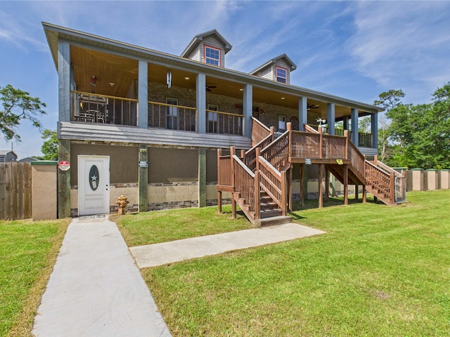 650 Sudduth Dr, Bridge City, TX 77611 - view of front facade with a ceiling fan and stairs