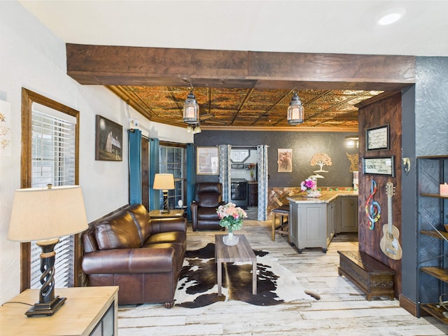 650 Sudduth Dr, Bridge City, TX 77611 - living room featuring light wood-style flooring and crown molding