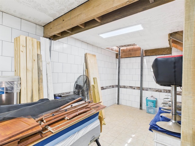650 Sudduth Dr, Bridge City, TX 77611 - miscellaneous room with tile walls and tile patterned floors