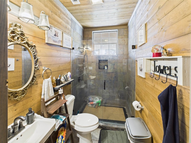 650 Sudduth Dr, Bridge City, TX 77611 - bathroom featuring toilet, wood walls, a sink, a shower stall, and wood ceiling