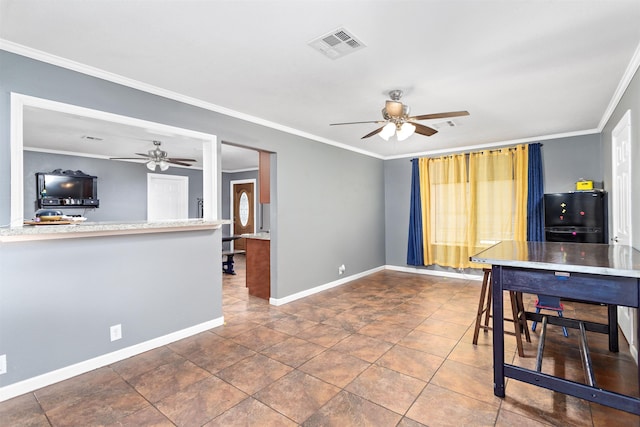 dining space featuring a ceiling fan, visible vents, crown molding, and baseboards