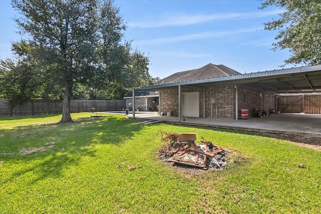 view of yard featuring a carport