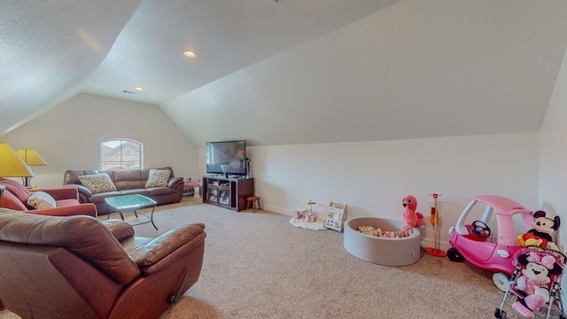 108 Colonial Estates Dr, Bridge City, TX 77611 - carpeted living area with lofted ceiling and baseboards