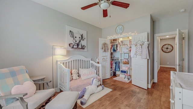 108 Colonial Estates Dr, Bridge City, TX 77611 - bedroom with a closet, light wood-type flooring, and baseboards