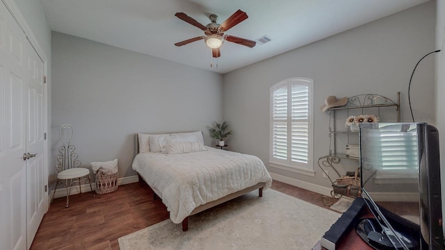 108 Colonial Estates Dr, Bridge City, TX 77611 - bedroom featuring baseboards, wood finished floors, and ceiling fan