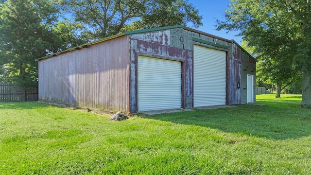 garage with a yard