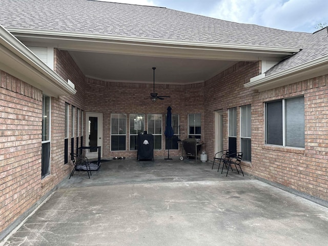 view of patio featuring a ceiling fan