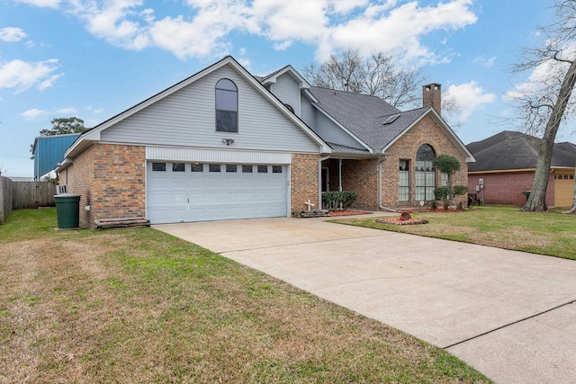 view of front of house featuring fence, concrete driveway, a front yard, brick siding, and a chimney