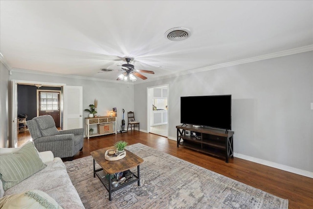 980 N 23rd St, Beaumont, TX 77706 - living area with wood finished floors, crown molding, baseboards, and ceiling fan