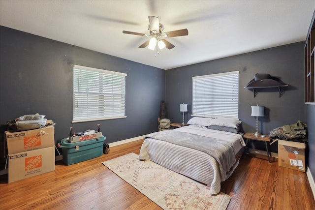 980 N 23rd St, Beaumont, TX 77706 - bedroom with wood finished floors and a ceiling fan