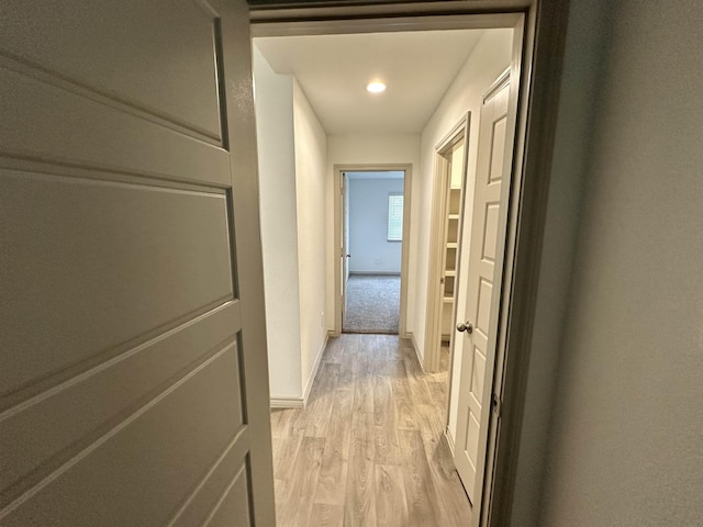 1525 Holly Trl, Sour Lake, TX 77659 - hallway featuring light wood finished floors and recessed lighting
