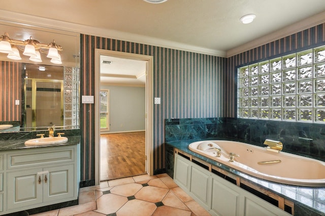 bathroom with vanity, tile patterned flooring, a wealth of natural light, and plus walk in shower