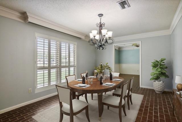 dining area featuring ornamental molding, a wealth of natural light, and a notable chandelier