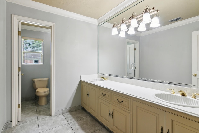 bathroom featuring crown molding, tile patterned floors, toilet, and vanity