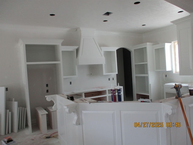9250 Bellflower St, Beaumont, TX 77713 - kitchen featuring ornamental molding and white cabinets