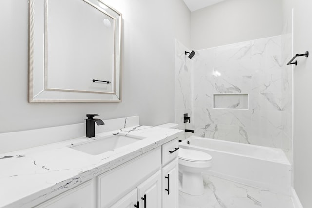 full bathroom featuring tiled shower / bath combo, toilet, and vanity