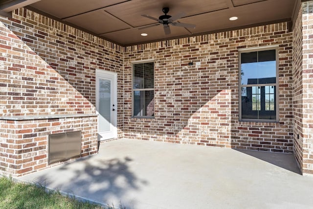 view of patio / terrace featuring ceiling fan