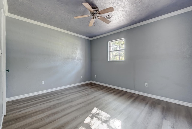 unfurnished room featuring a textured ceiling, hardwood / wood-style flooring, ceiling fan, and crown molding