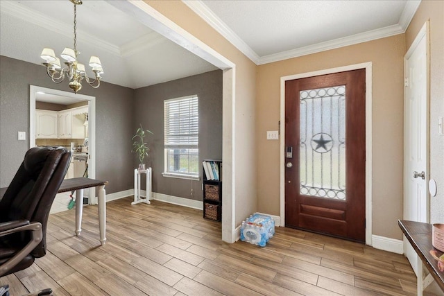 6006 Hazelwood Dr, Orange, TX 77632 - foyer with an inviting chandelier, crown molding, and light hardwood / wood-style flooring