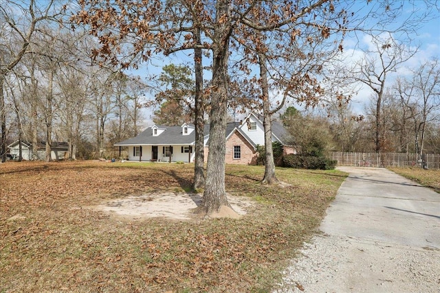 view of front of property with a front lawn