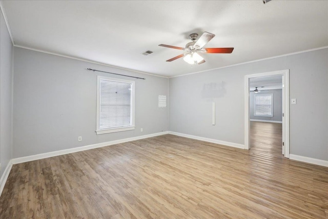 2342 Briarcliff Dr, Beaumont, TX 77706 - empty room featuring ceiling fan, ornamental molding, light wood finished floors, and baseboards