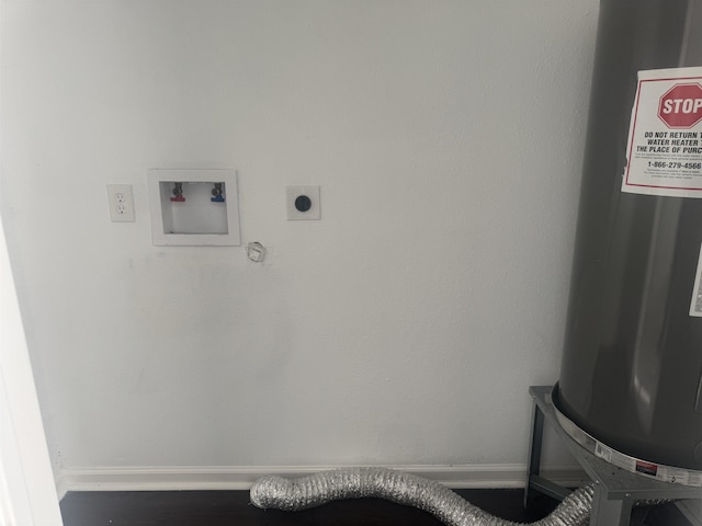 interior space featuring hookup for an electric dryer and gas water heater