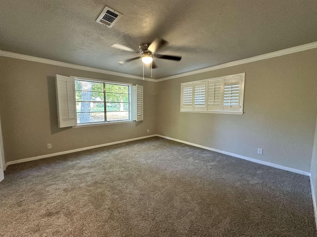 carpeted spare room with a textured ceiling, ceiling fan, and ornamental molding