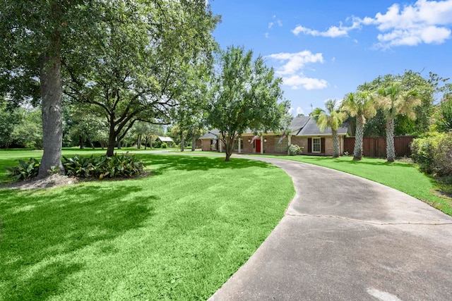 1280 Cherokee Ln, Beaumont, TX 77702 - ranch-style house featuring driveway