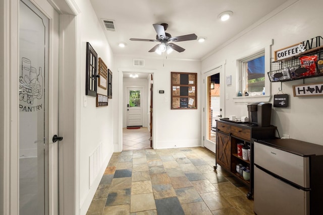 1280 Cherokee Ln, Beaumont, TX 77702 - hall featuring stone finish floors, crown molding, and recessed lighting