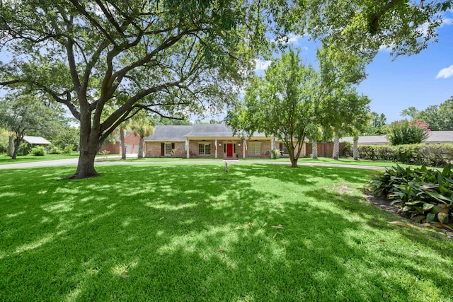 1280 Cherokee Ln, Beaumont, TX 77702 - view of grassy yard