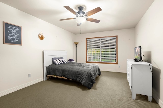 1280 Cherokee Ln, Beaumont, TX 77702 - carpeted bedroom with baseboards and ceiling fan