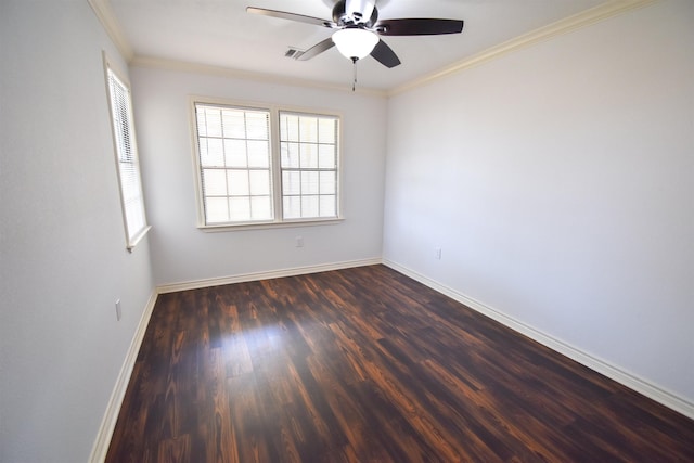 unfurnished room featuring visible vents, dark wood-type flooring, baseboards, ceiling fan, and ornamental molding