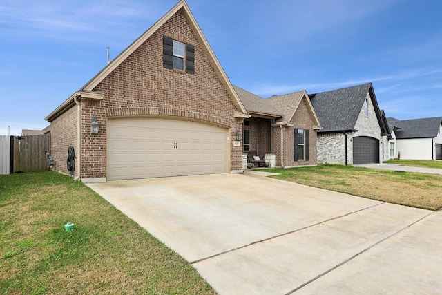 view of front facade featuring a garage and a front yard