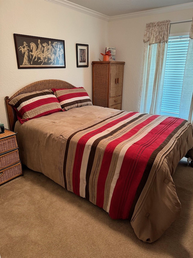 carpeted bedroom with ornamental molding