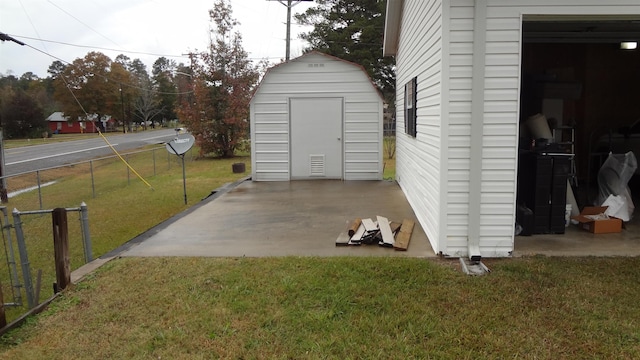 view of outdoor structure featuring a lawn