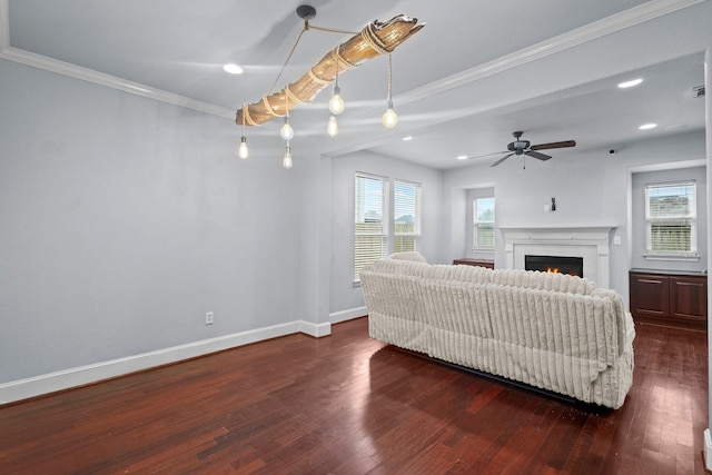 2635 Cedar Spgs, Port Arthur, TX 77630 - living area featuring crown molding, baseboards, plenty of natural light, and dark wood-type flooring