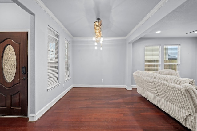2635 Cedar Spgs, Port Arthur, TX 77630 - foyer entrance featuring crown molding, a wealth of natural light, and wood finished floors