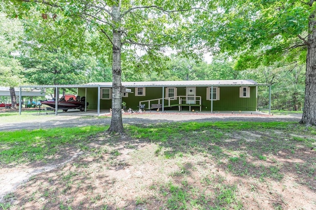 manufactured / mobile home with a carport